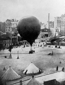 One of the balloons ready for departure, made in a deserted railroad station in Paris.  Every 3 or 4 days a new balloon was made and inflated with explosive coal gas from the city gas works.
